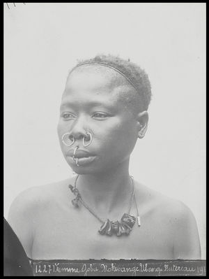 Head And Shoulders Portrait Of Woman With Two Nose Rings And