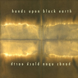 hands upon black earth hands upon black earth